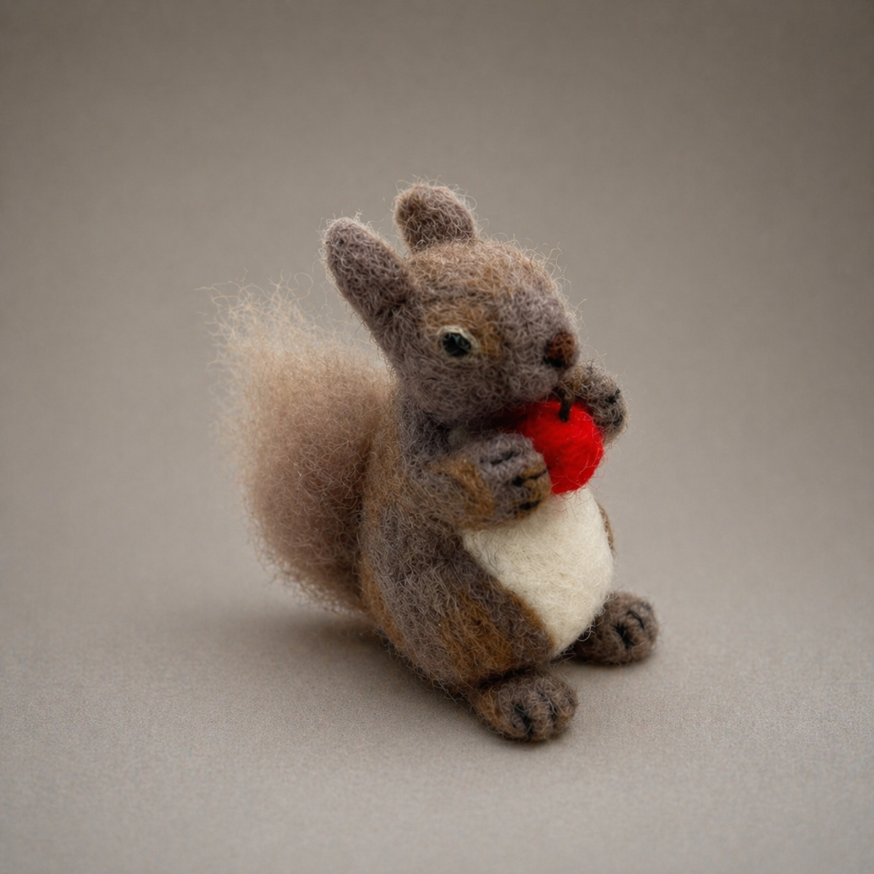 Handmade Wool Felt Squirrel with Red Acorn Figurine – Cute Forest Animal Decor