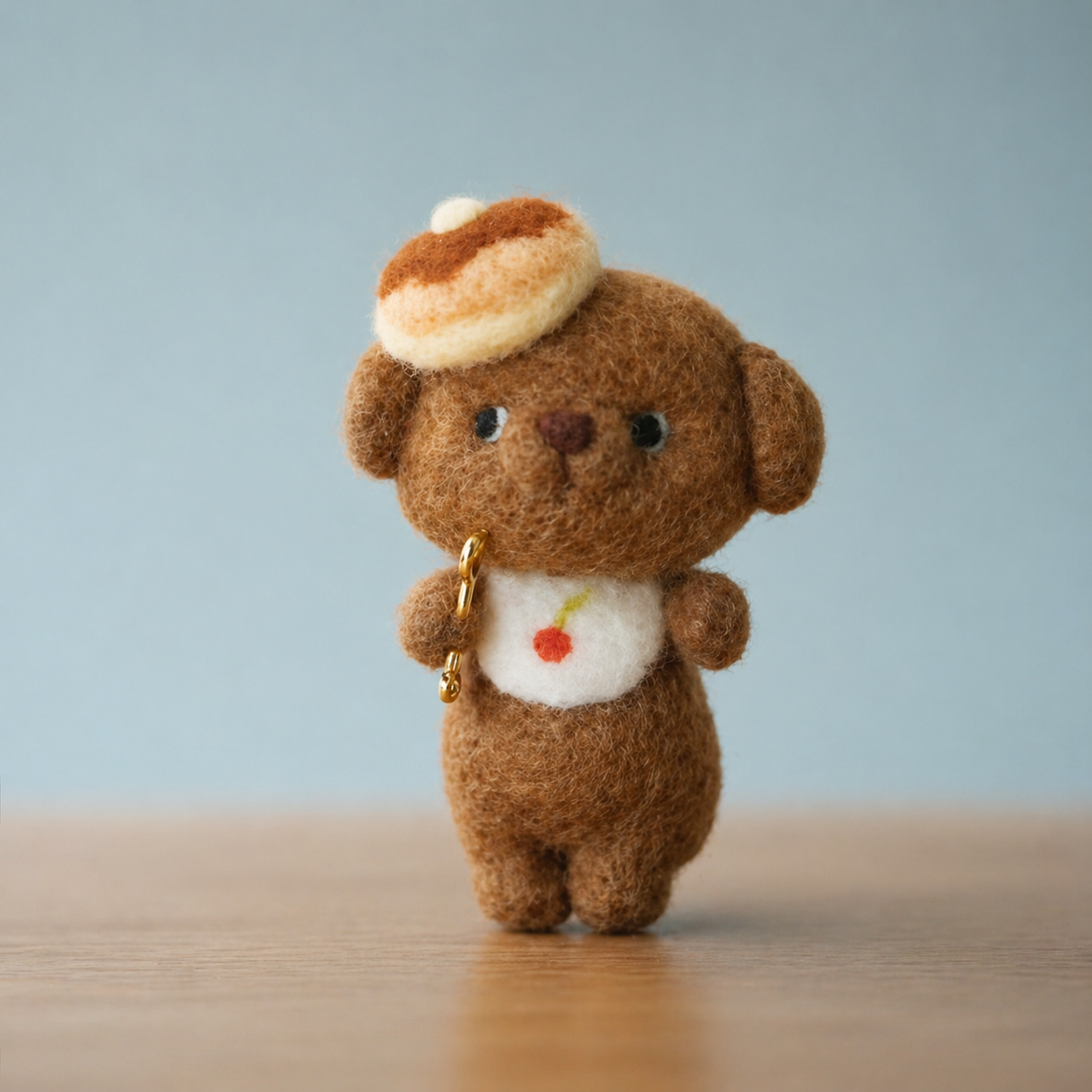Handmade Wool Felt Brown Puppy with Pancake Hat Figurine – Cute Food-Themed Decor